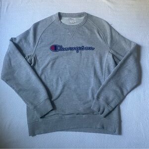 Grey Champion sweatshirt with embroidered logo on sleeve